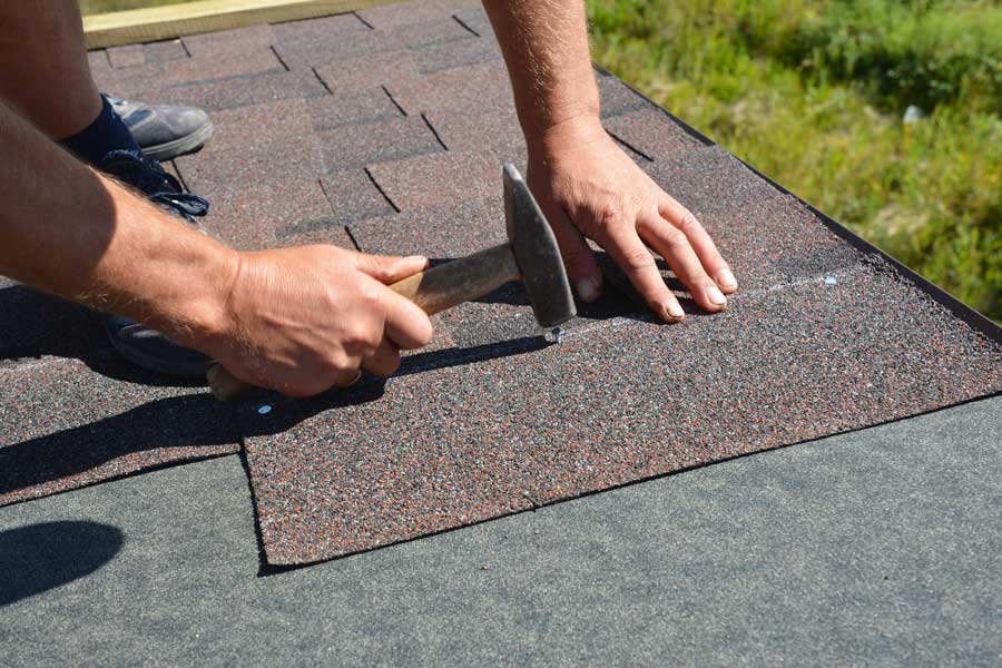 Toronto home with eco-friendly asphalt shingles made from recycled materials.