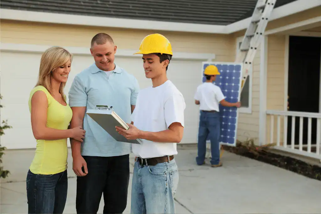 Roofing contractor discussing a detailed roofing estimate with a Toronto homeowner.