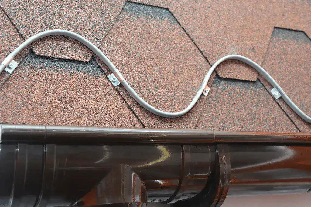 Roof insulation and ventilation to prevent ice dams in winter.