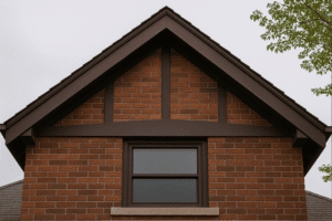 Arts and Crafts brick gable repair and staining