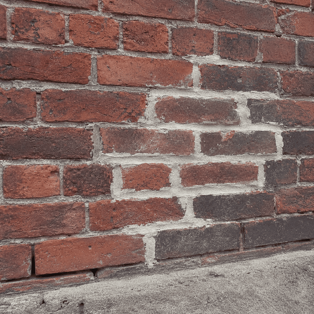 Mismatched mortar repair on older Toronto brickwork