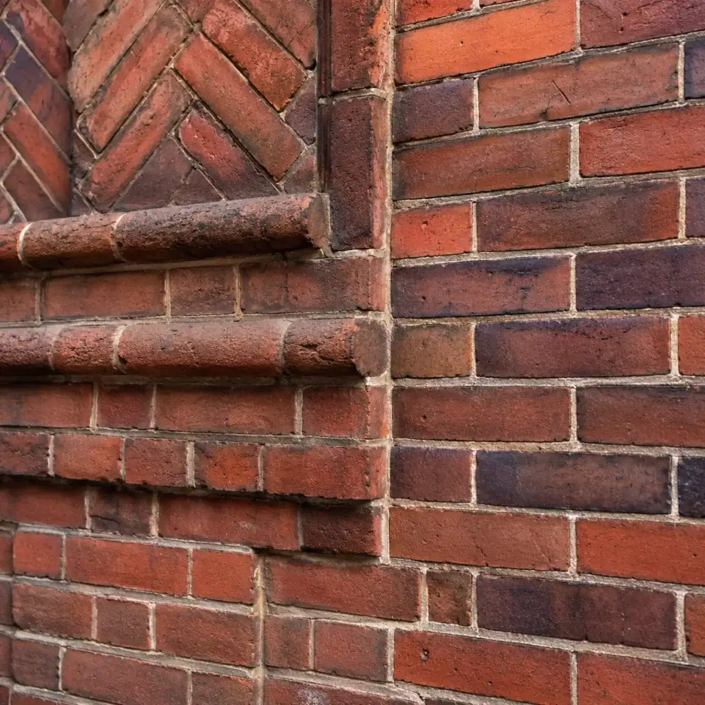 Historic Toronto brickwork with decorative details and aged mortar